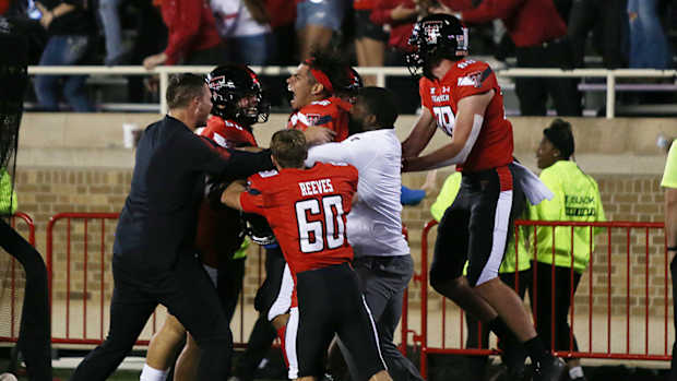 Texas Tech players celebrate win.